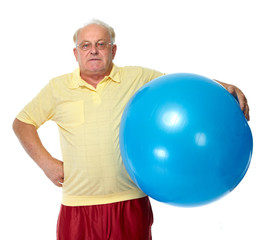 Wall Mural - Elderly man with exercise ball.