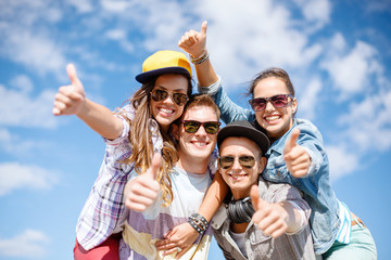 Sticker - smiling teenagers in sunglasses hanging outside