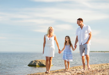 Wall Mural - happy family at the seaside