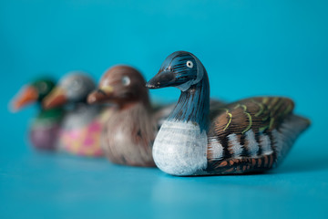 series of toy ducks