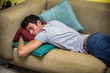 © theartofphoto - Drunk Young Man Sleeping on the Living Room Couch