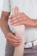 © WavebreakmediaMicro - Physiotherapist doing hand massage