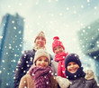 © Syda Productions - happy family in winter clothes outdoors