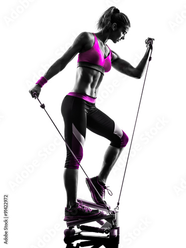 Naklejka ścienna woman fitness stepper exercises silhouette