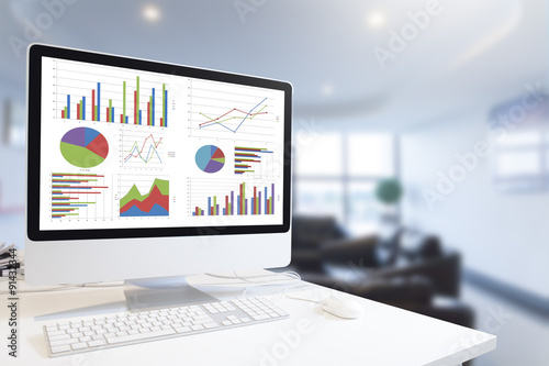 Fotografie, Obraz Computer showing analysis chart and graph in office