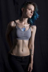 Wall Mural - Blue haired girl pose in studio