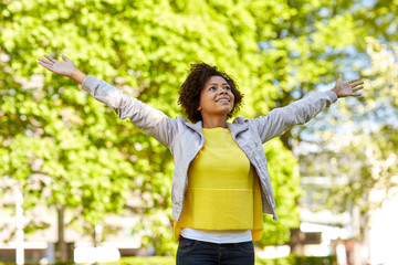 Poster - happy african american young woman in summer park