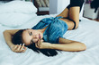 © teksomolika - beautiful young girl posing on a white bed