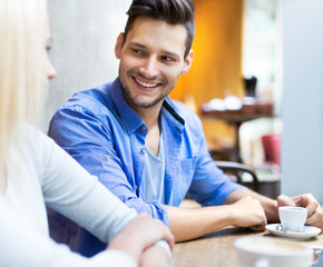 Wall Mural - Young couple at cafe