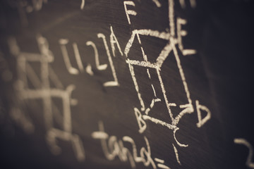 Wall Mural - Maths formulas on chalkboard background