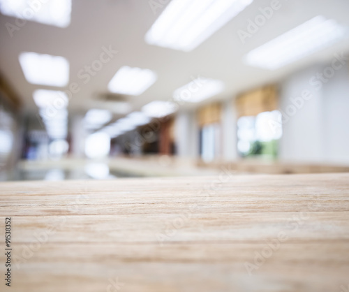 Fotografía Table top with Blurred Office space Interior Background