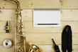 Saxophone on the Wood Background