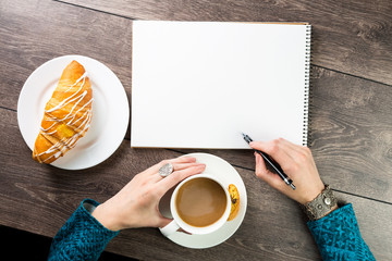 Creative Lunch coffee break inspiration. Draw sketches or write brilliant ideas. Inspiration for designer artist. Empty space notebook for blog entries, you can place your text information. Top view.