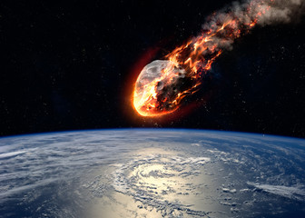 meteor glowing as it enters the earth's atmosphere