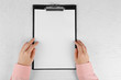 © Africa Studio - Hands working in the office with documents  on white table