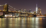 Fototapeta  - Brooklyn bridge and Manhattan at night, New York City, USA.