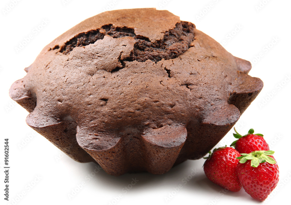 Tasty chocolate muffin with strawberries isolated on white