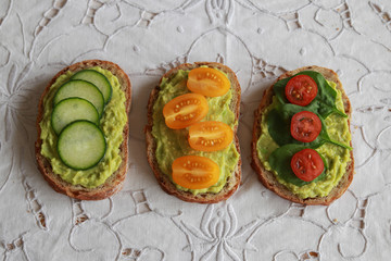 Wall Mural - Green sourdough open face sandwiches