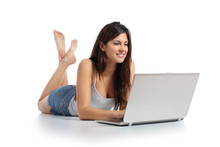 Woman Lying And Working With A Laptop