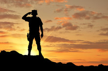 Silhouette Of A Soldier Salutes