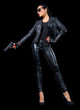 © Boris Riaposov - Young woman in leather clothes with gun