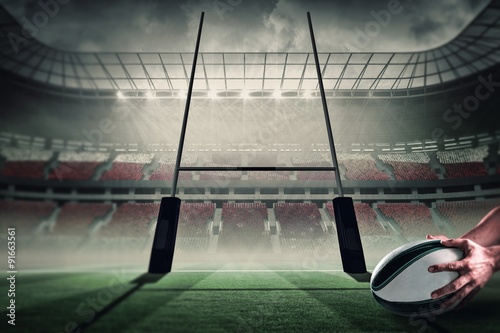 Fototapety Rugby  zlozony-obraz-zblizenia-sportowca-trzymajacego-pilke