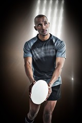 Poster - Composite image of athlete throwing rugby ball