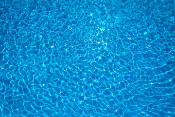 Wall Mural - Rippled water in swimming pool