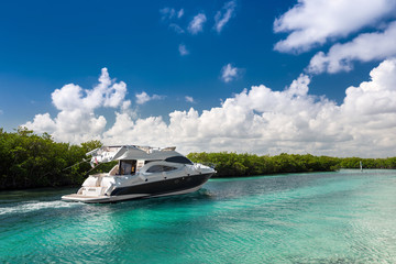 Luxury  motor yacht sailing out at sea