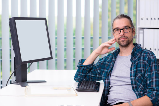 man is working in his office
