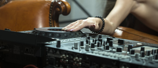 Female hand and console