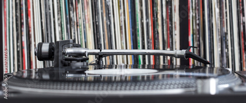 Dj turntable on vinyl background Canvas Print