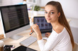 © shefkate - Portrait of an attractive young businesswoman sitting in front