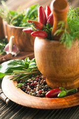 Poster - Spices and herbs on a wooden