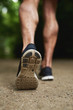 © Flamingo Images - Shoe Sole of a Man Running at the Park