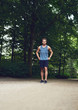 © Flamingo Images - Athletic Man at the Park with Hands on Waist