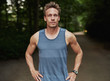 © Flamingo Images - Athletic Man at the Park with Hands on Waist
