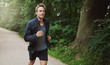 © Flamingo Images - Healthy Man in Jacket Jogging at the Park
