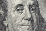 Fototapeta Dmuchawce - Benjamin Franklin's face on the US 100 dollar bill