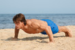 © blackday - Man during workout on the beach