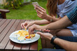 © jakubzak - The close-up of eating tortilla-chips, there is telephone either.