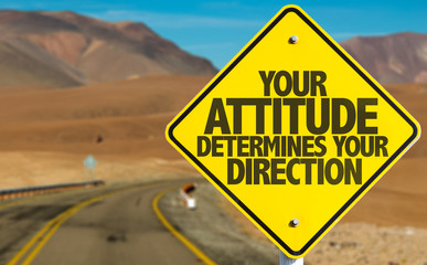 your attitude determines your direction sign on desert road