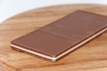 Brown White Chocolate On A Wooden Board