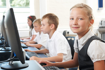 Wall Mural - Group Of Elementary Pupils In Computer Class With Teacher