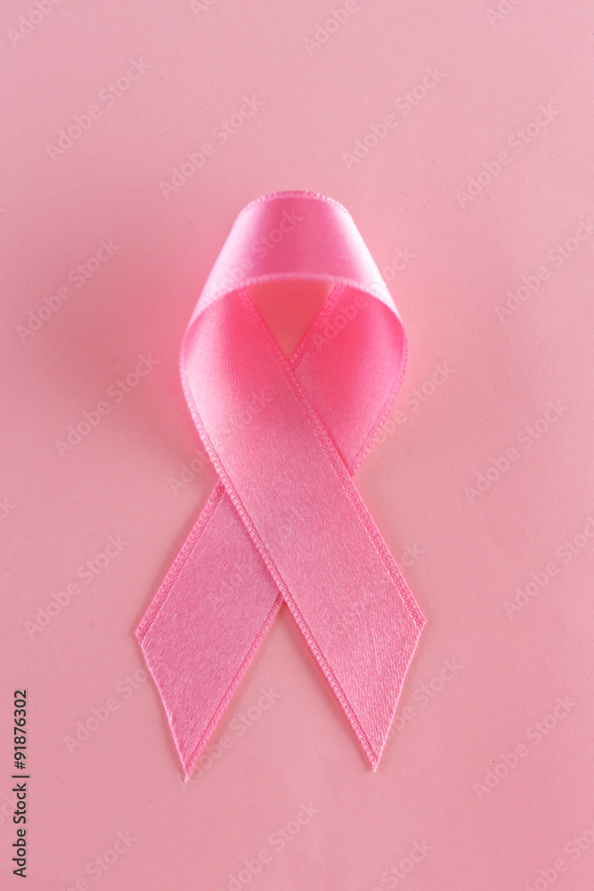 Satin ribbon sign on pink background