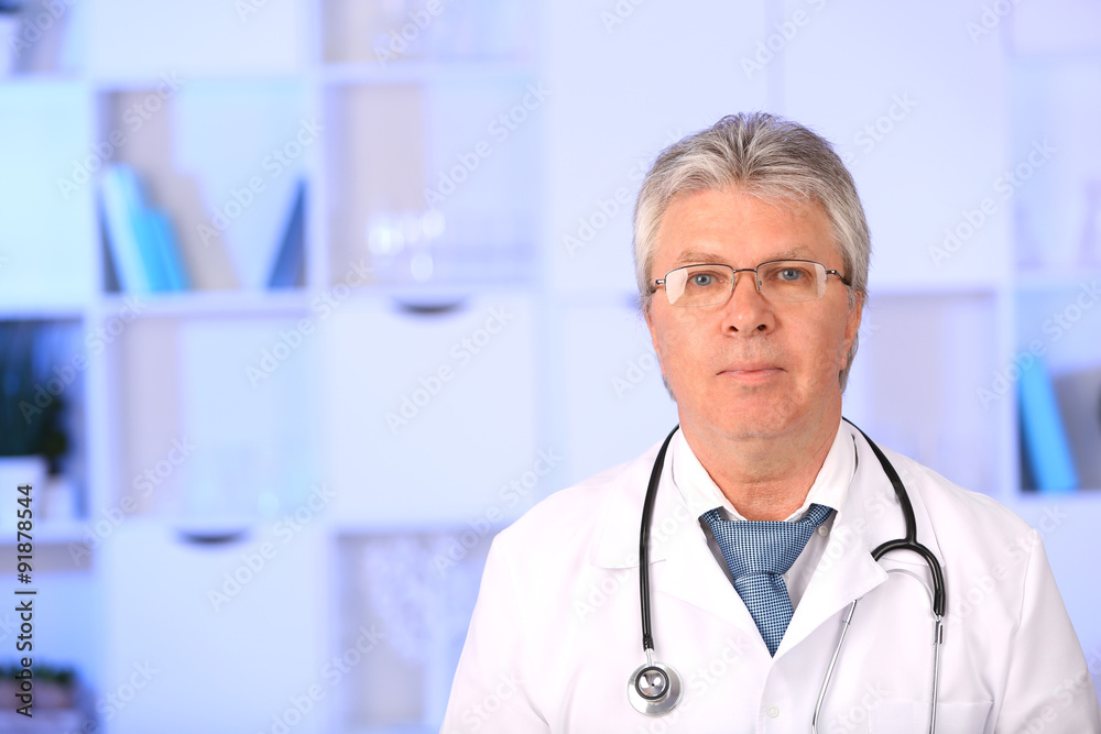 Doctor with stethoscope at his workplace