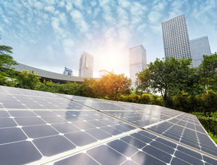 Wall Mural - solar panels in the park of modern city