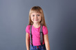 © Africa Studio - Beautiful little girl on gray background