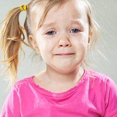 little girl with tooth pain