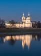 Krakow, Poland, scenic Vistula riverbank with Pauline fathers church (Skalka) in the evening